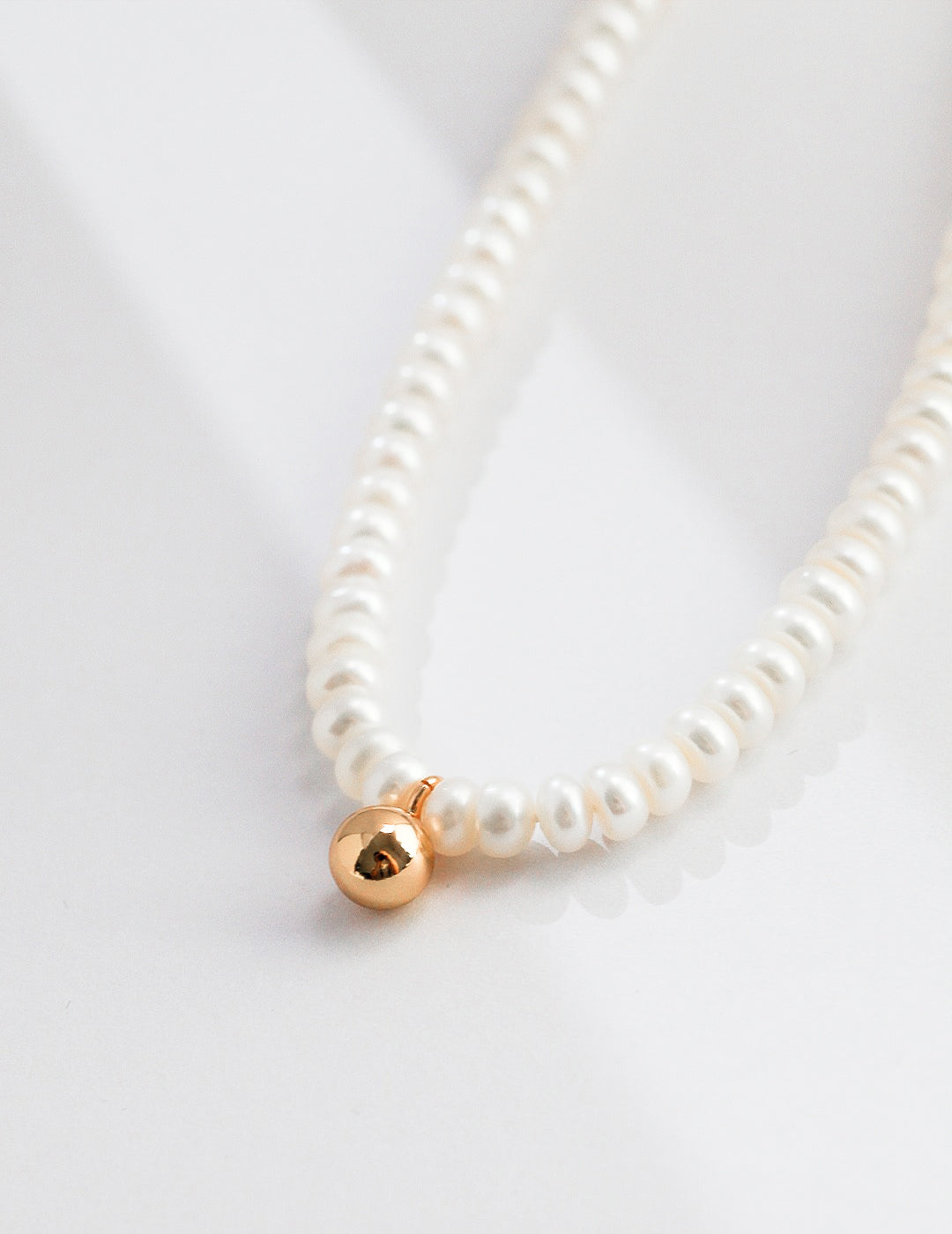 Stellar Gold Bead Pearl Necklace